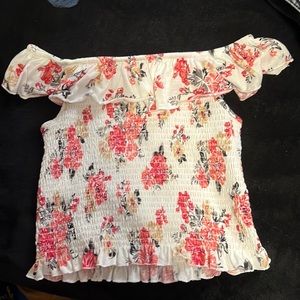 Super cute white floral starchy off the shoulder top.